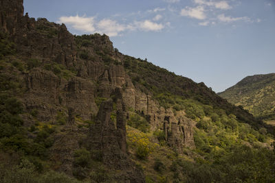 Scenic view of rocky mountains against sky