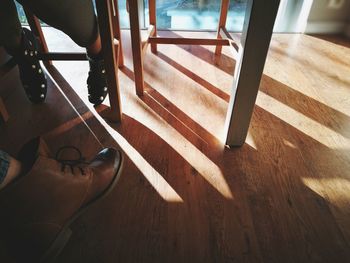 High angle view of chairs on floor at home