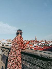 One girl in the city of porto, portugal with a view