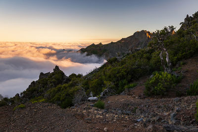 Scenic view of mountains against sky during sunset