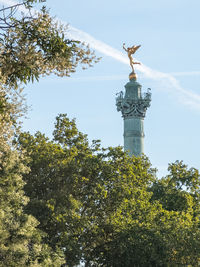 Low angle view of statue against sky