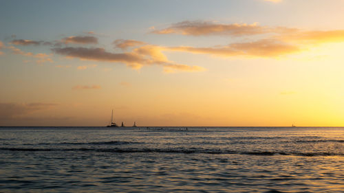 Scenic view of sea against sky during sunset
