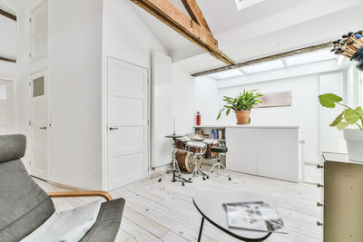 Chairs and table against white wall at home