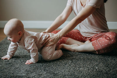 The little baby started to crawl. selective focus, soft focus, defocused