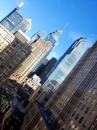 Low angle view of buildings in city against sky