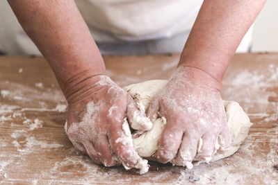 Close-up of man preparing food