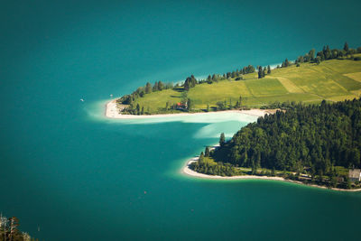 Scenic view of sea against clear blue sky