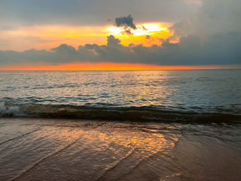 Scenic view of sea against sky during sunset