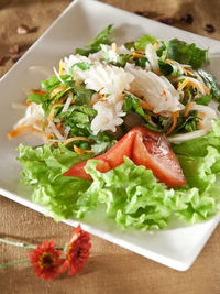 High angle view of salad in bowl on table