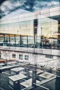 Reflection of building on glass window