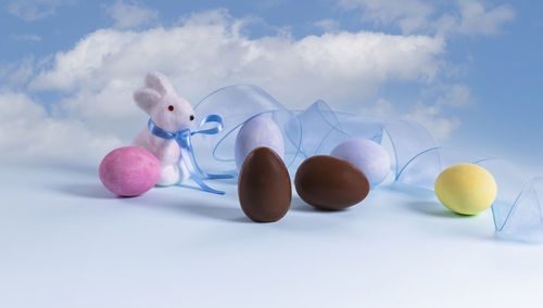 Close-up of eggs against white background