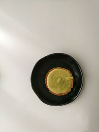 High angle view of drink against white background