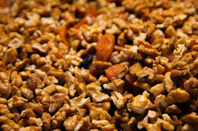 Dried mixture of walnuts and dried fruits close-up. mix for adding to baked goods.healthy vegan food