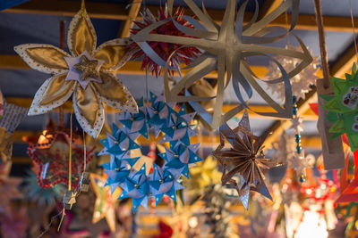Low angle view of christmas decoration hanging from ceiling