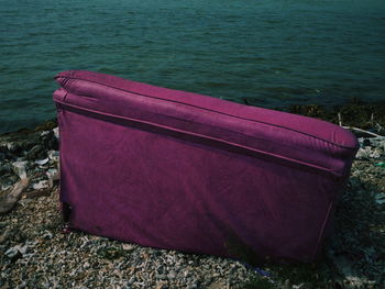 Boat moored on beach