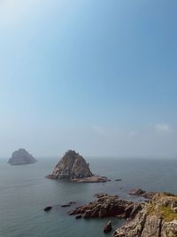 Scenic view of sea against clear sky