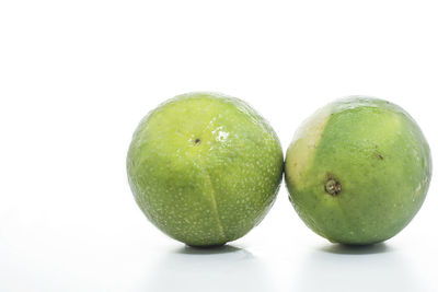 Close-up of apple against white background