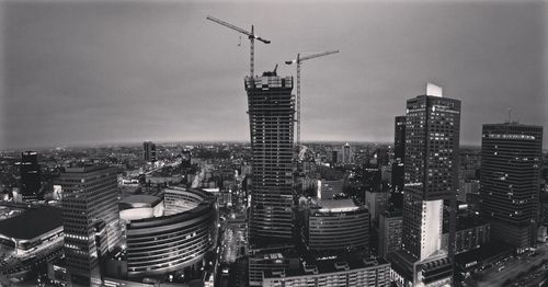 Modern buildings in city against sky