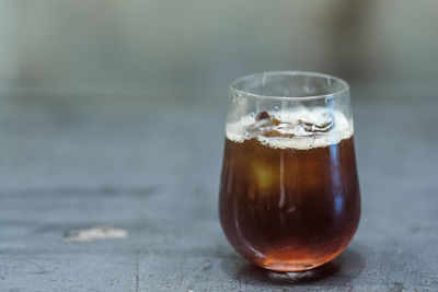 Close-up of drink in glass jar on table