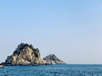 Scenic view of sea against clear sky