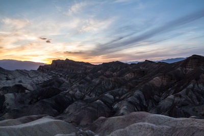 Scenic view of mountains against sky during sunset