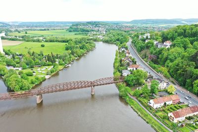 High angle view of river amidst landscape against sky