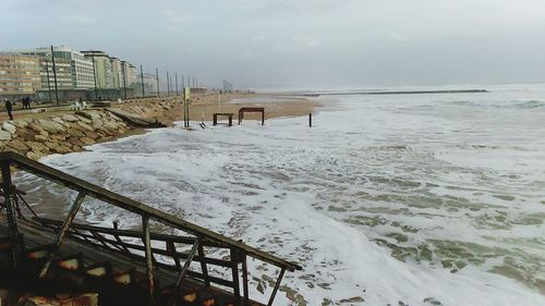 Scenic view of sea against sky during winter