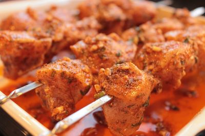 Close-up of meat on barbecue grill