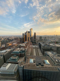 High angle view of buildings in london city against sky during sunset. taken from broadgate tower