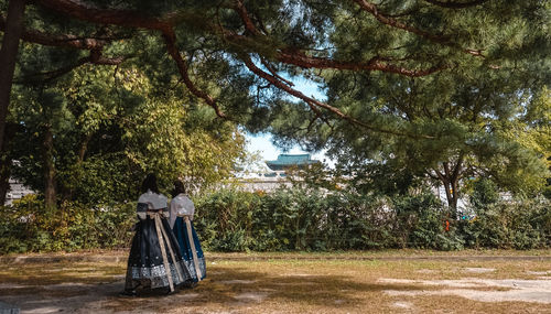 Couple standing in park