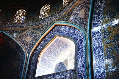 Low angle view of ornate ceiling of building