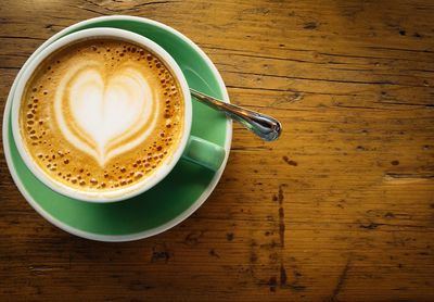 High angle view of cappuccino on table