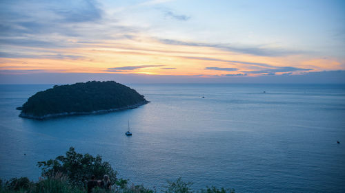 Scenic view of sea against sky during sunset
