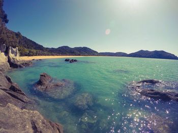 View of calm blue sea against clear sky