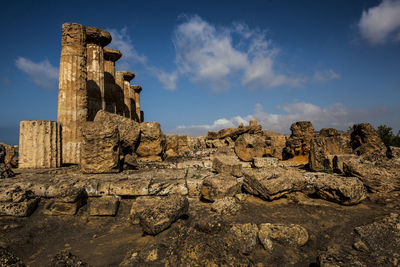 Old ruins of building against cloudy sky