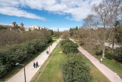 High angle view of people walking on road