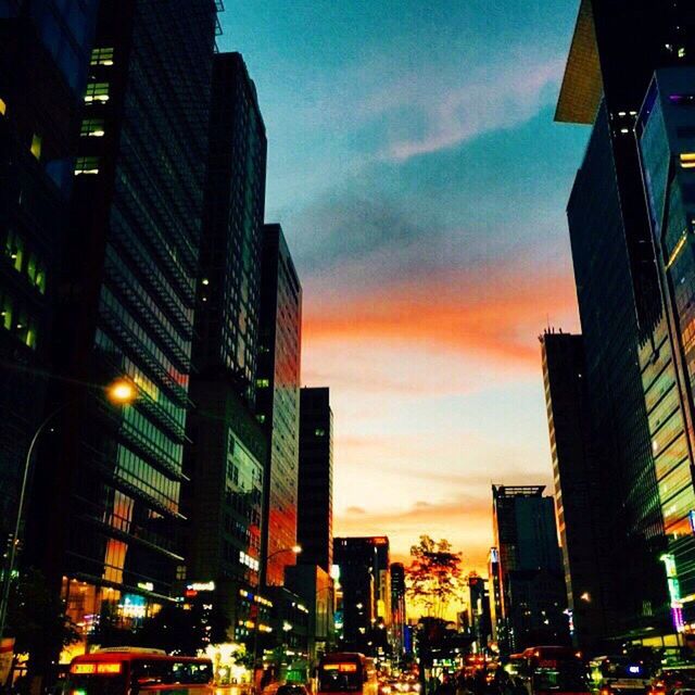 VIEW OF CITYSCAPE AT SUNSET