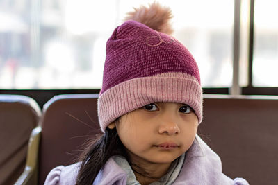 Portrait of cute boy wearing hat