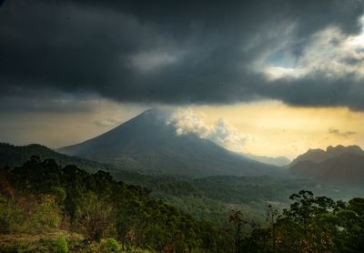 Scenic view of mountains against sky during sunset