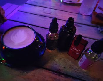 High angle view of bottles on table in restaurant