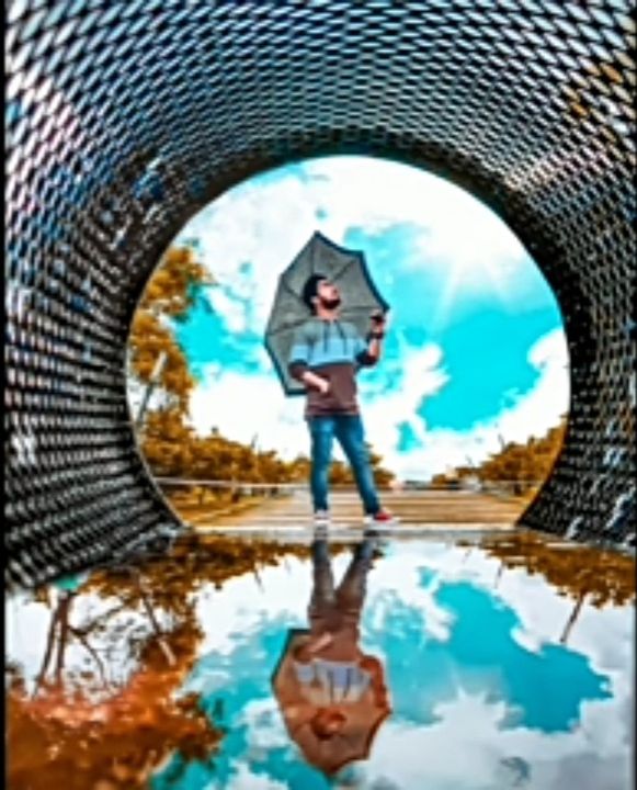 reflection, one person, full length, standing, adult, cloud, nature, photomontage, young adult, person, water, day, sky, architecture, digital composite, front view, casual clothing, art, outdoors, cartoon, portrait, men, looking, poster