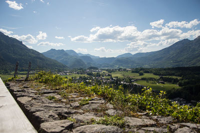 Scenic view of mountains against cloudy sky