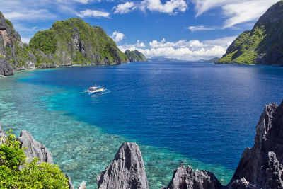 Panoramic view of sea against cloudy sky
