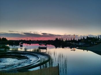 Panoramic view of city against sky during sunset