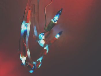 Close-up of illuminated lighting equipment