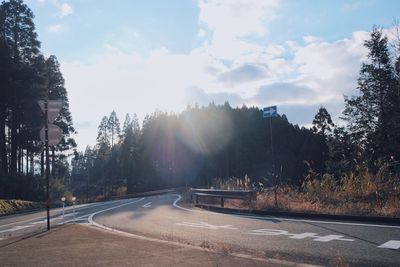 Road in city against sky