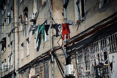 Low angle view of clothes hanging on building