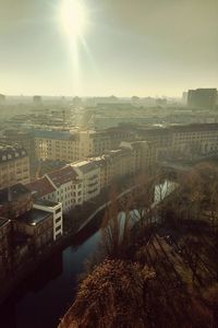 Aerial view of cityscape against sky