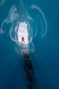 Man standing on glacier