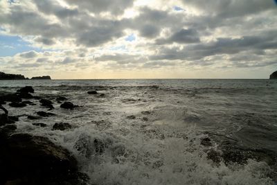 Scenic view of sea against sky during sunset
